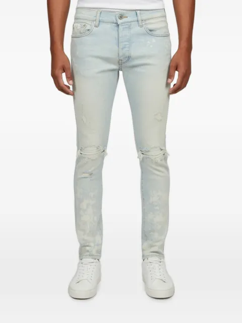 AMIRI vaqueros skinny con efecto envejecido