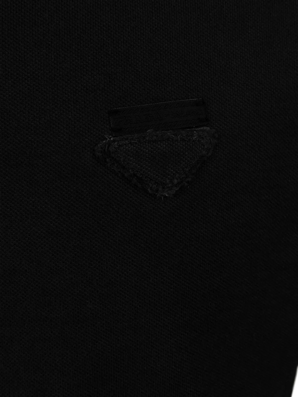 Prada Poloshirt met logopatch Zwart