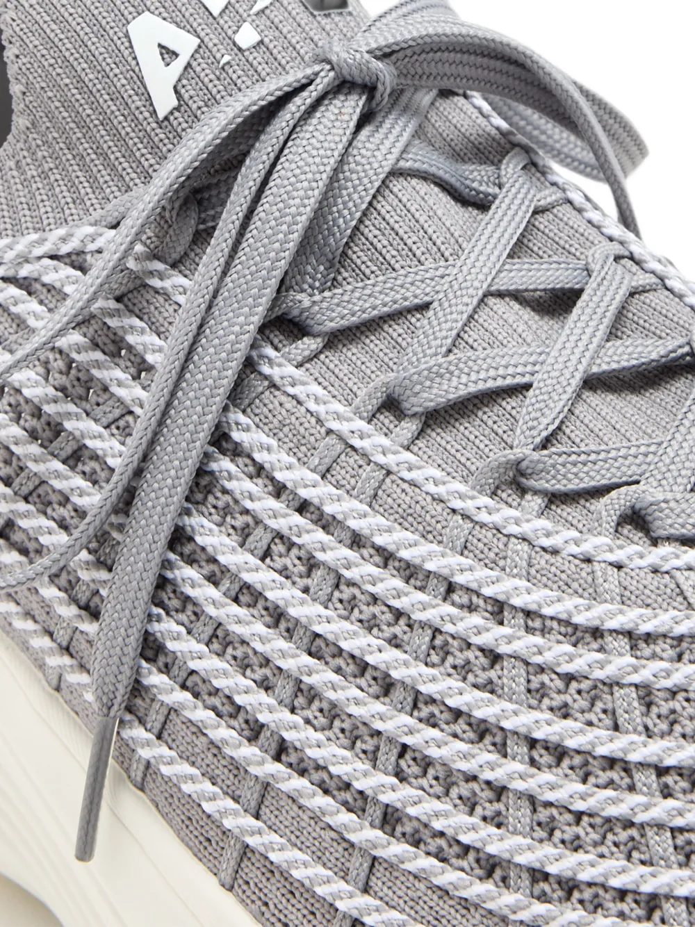 APL: ATHLETIC PROPULSION LABS knit lace-up sneakers Grijs