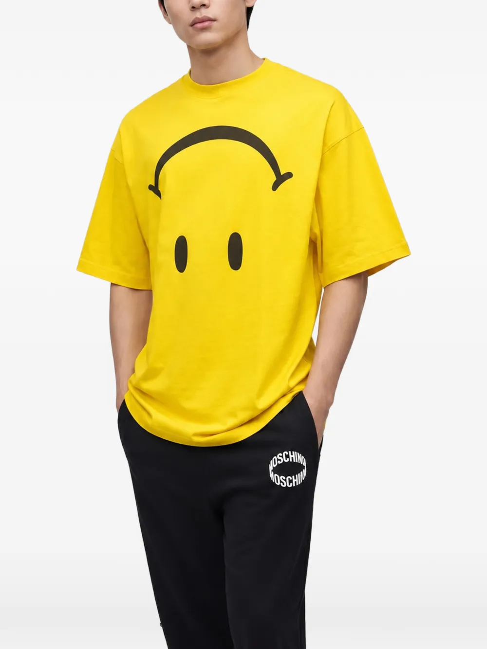 Moschino x Smiley katoenen T-shirt met grafische print Geel