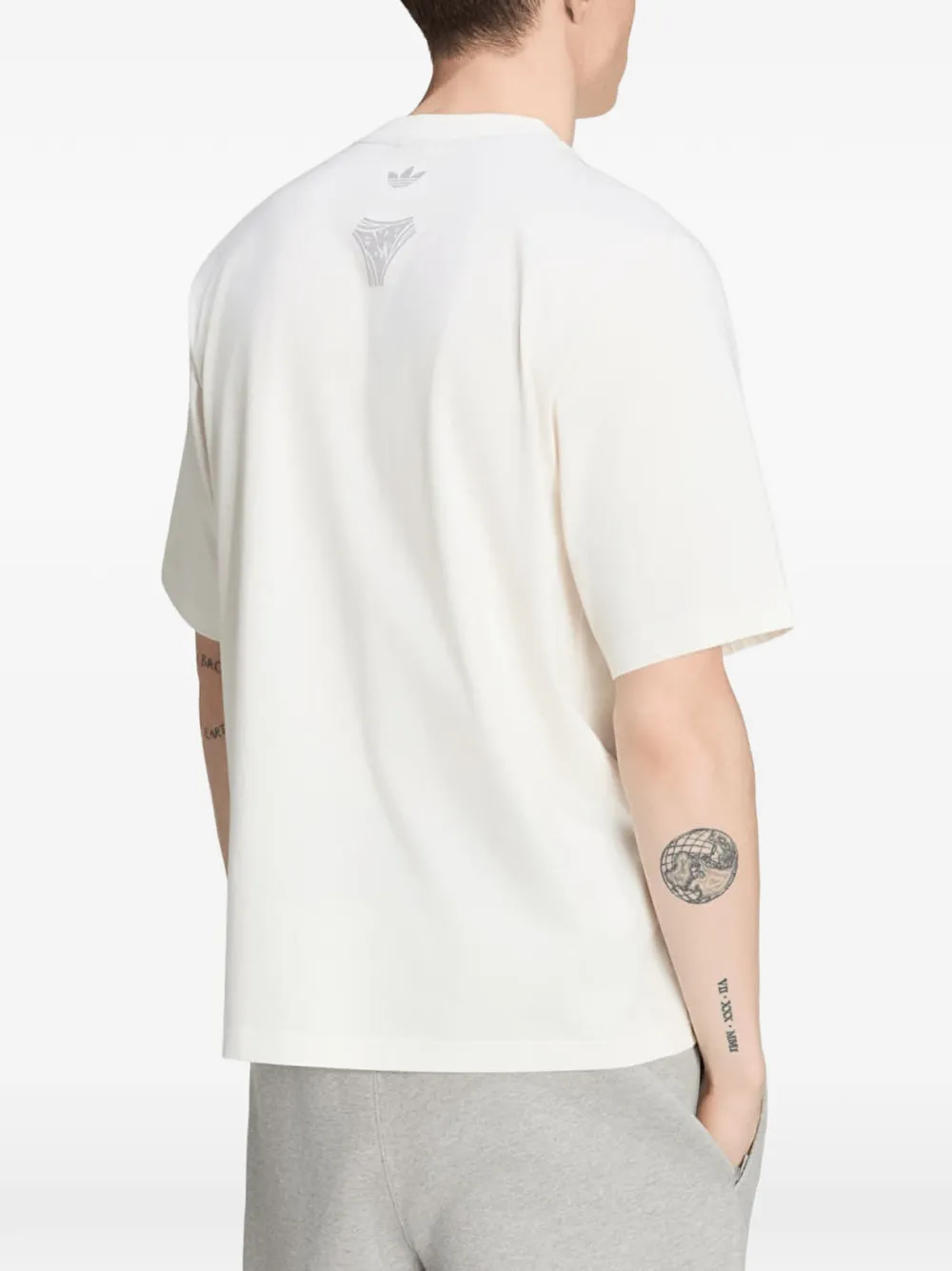 adidas Adilenium Questra graphic T-shirt Beige