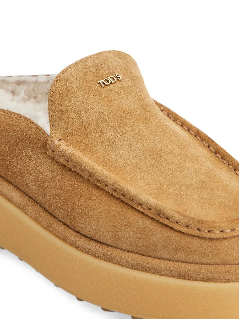 Tod's Loafers met lammy voering en logoplakkaat Beige