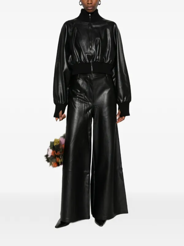 Norma Kamali Oversized faux-leather Jeans | Black | FARFETCH