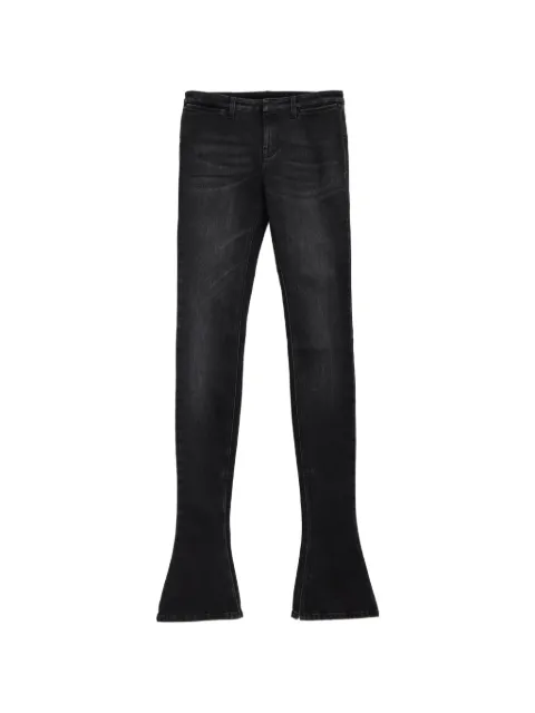 Gucci faded flared-hem jeans