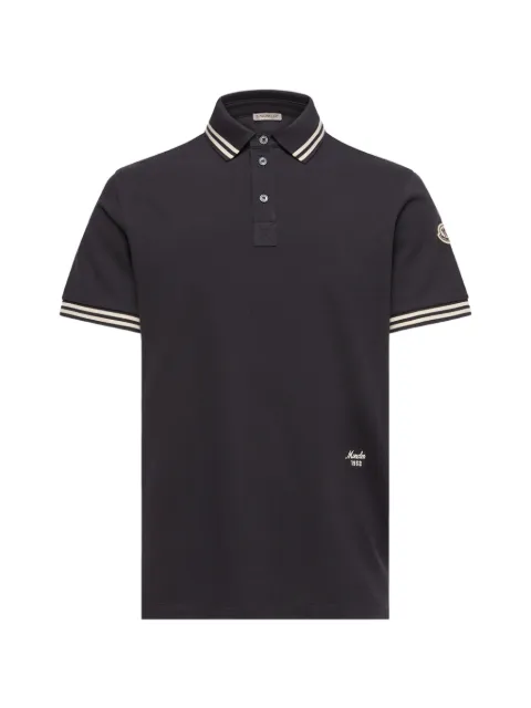 Moncler polo con ribetes de rayas