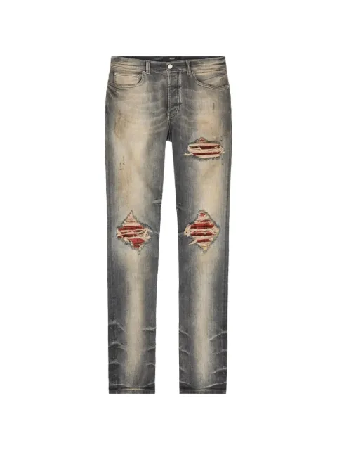 AMIRI vaqueros con efecto patchwork y diseño envejecido