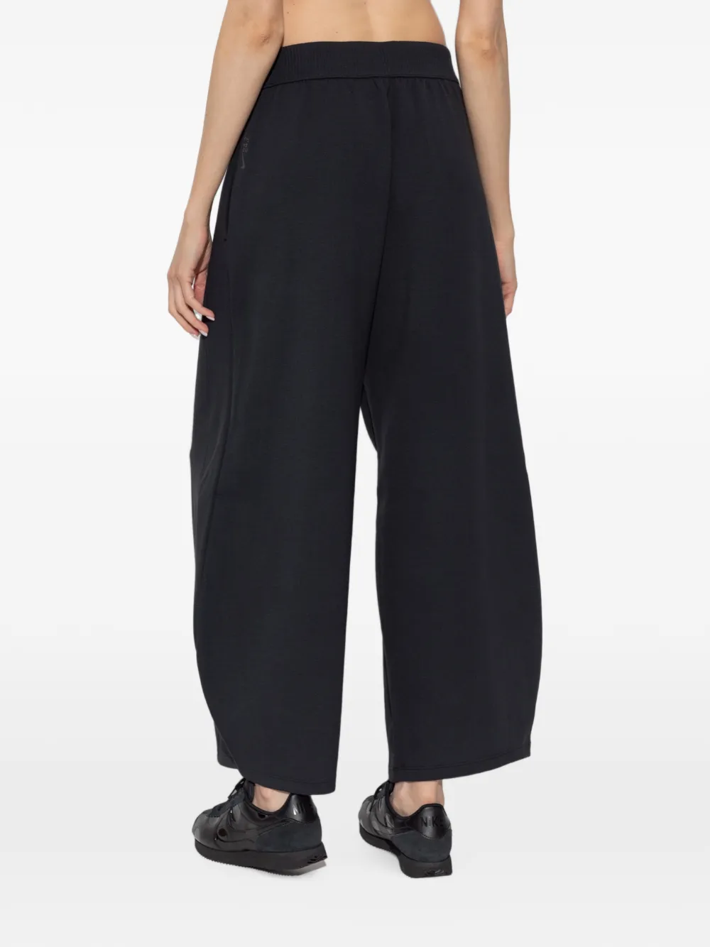 Nike Broek met wijde pijpen en gewelfde afwerking Zwart