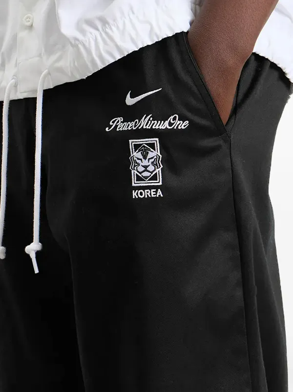 Nike x PEACEMINUSONE x KFA logo-embroidered Trousers | Black