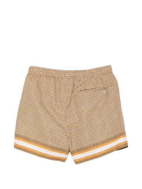 CHÉ Berkeley border-print swim shorts
