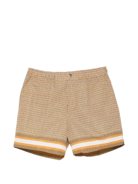 CHÉ Berkeley border-print swim shorts