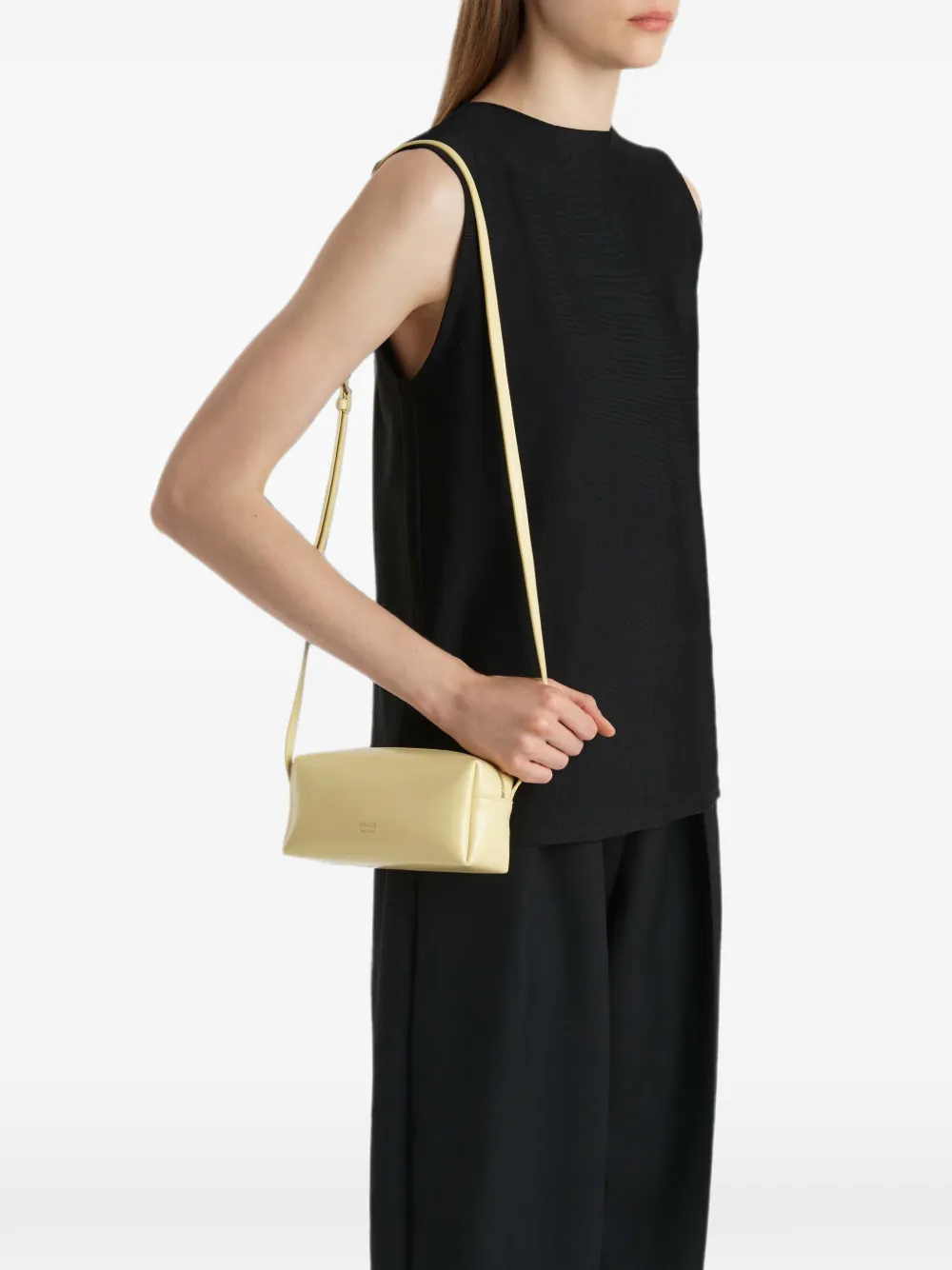 KHAITE mini Kye crossbody bag in pale-yellow crackle-patent leather - Giallo