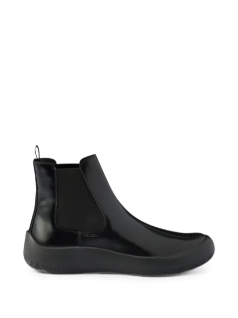 Prada bottines chelsea en cuir à effet brodé