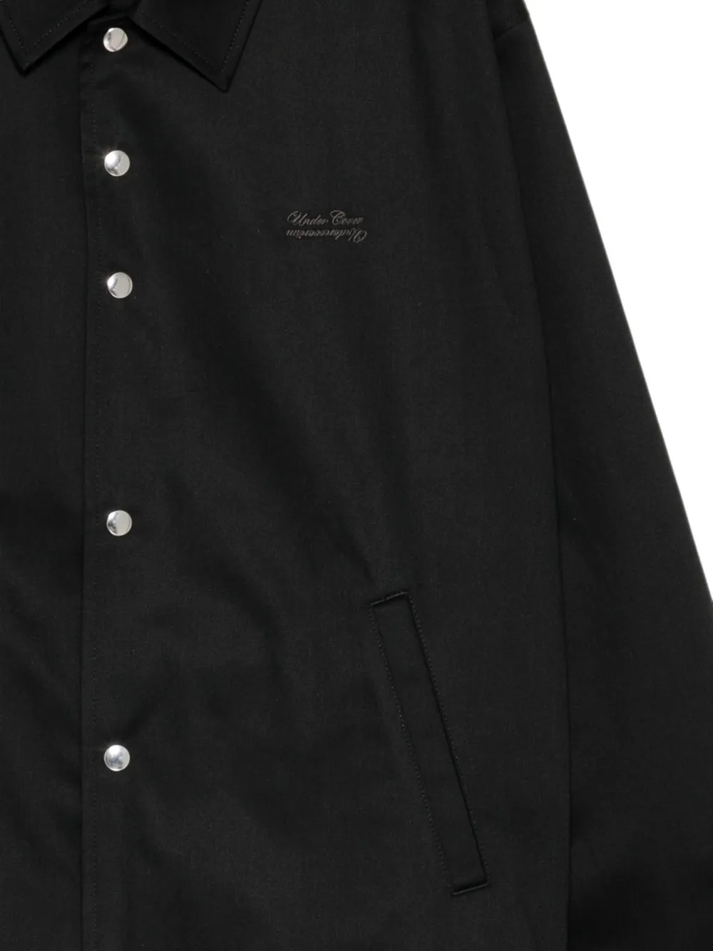 Undercover logo patched press-stud coach jacket Zwart