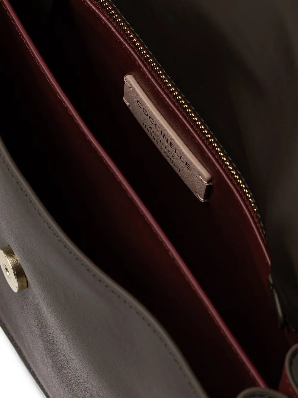 Coccinelle logo-embossed leather shoulder bag Bruin