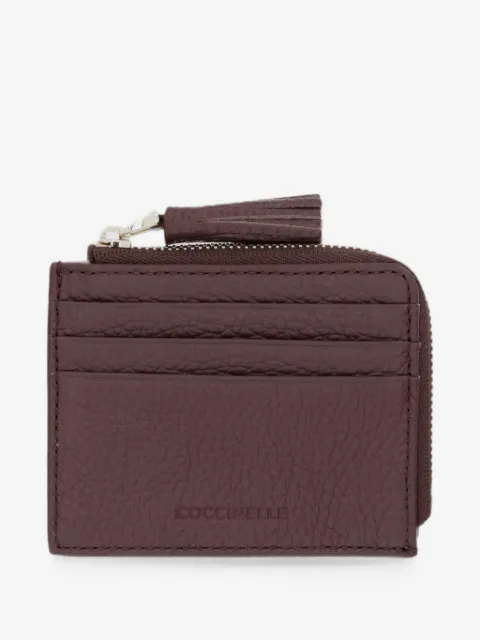 Coccinelle tarjetero pequeño con borla de piel texturizada
