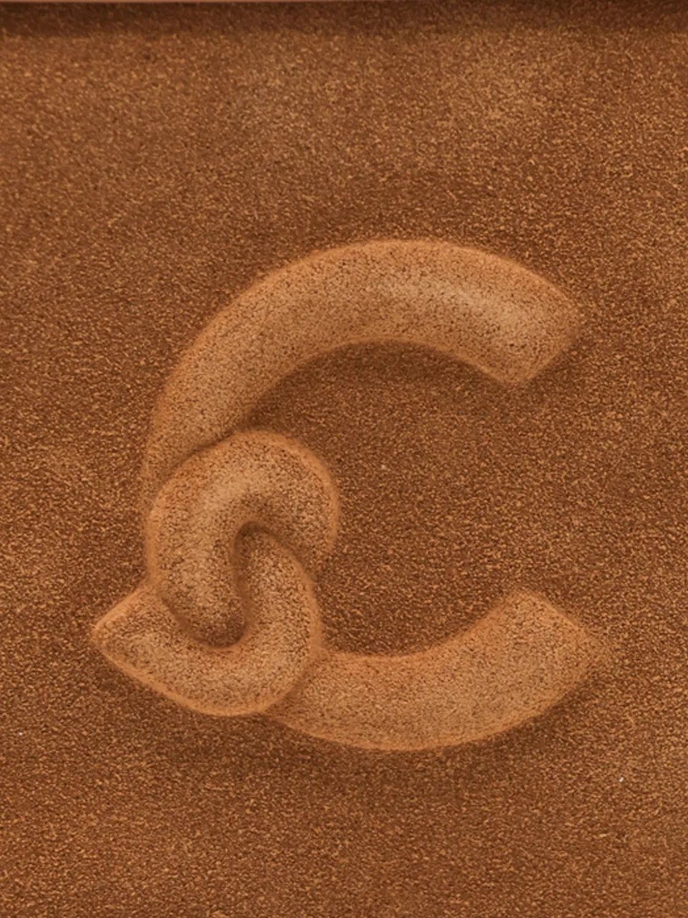 Coccinelle Medium Lidia suède schoudertas met logo-reliëf Bruin
