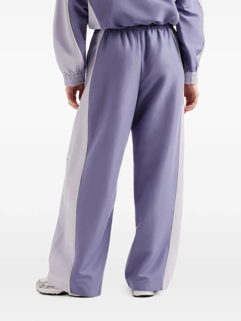 New Balance Trackside woven pants Paars