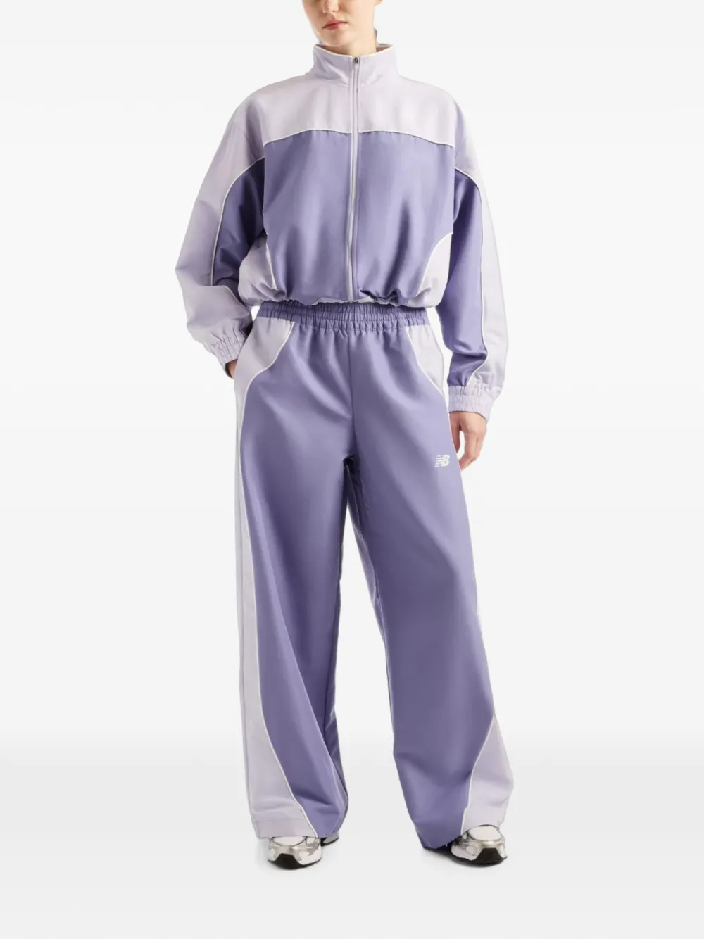 New Balance Trackside woven pants Paars