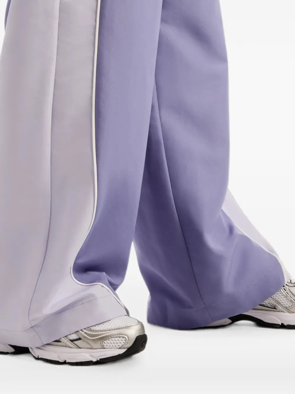 New Balance Trackside woven pants Paars