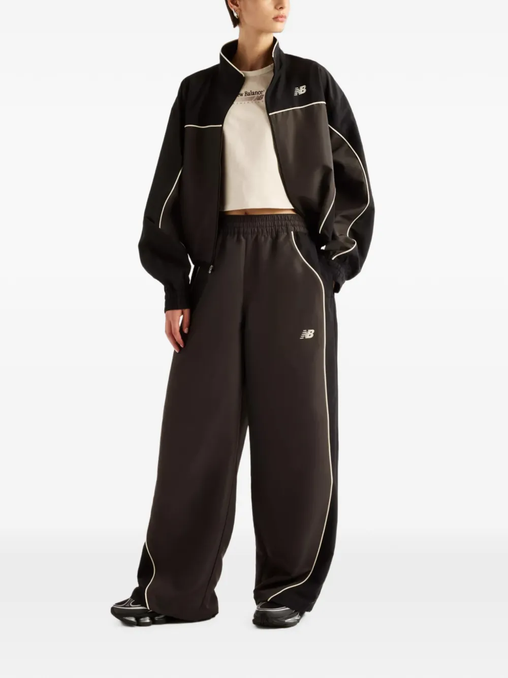 New Balance Trackside woven pants Grijs