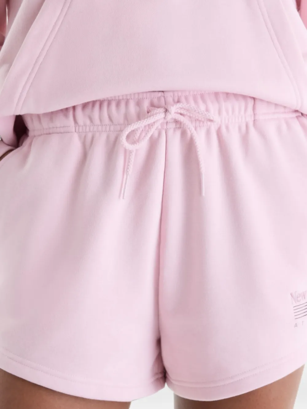 New Balance Trackside French terry shorts Roze