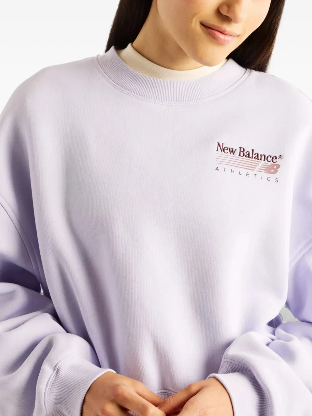 New Balance Trackside fleece crew sweatshirt Paars