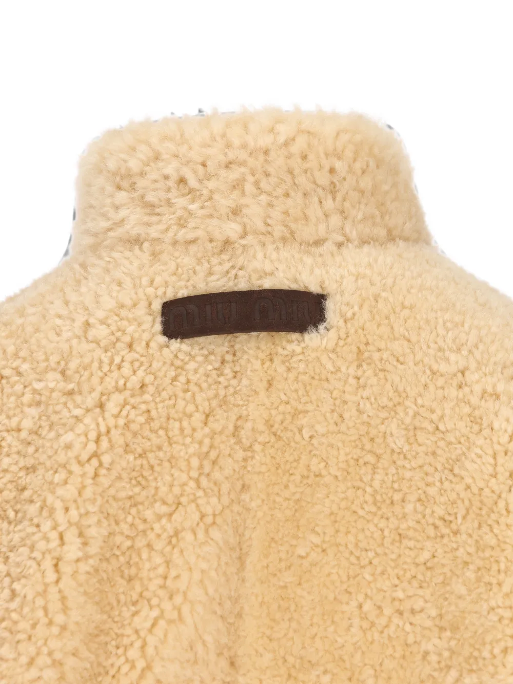 Miu Montone jack met fleece textuur en hoge hals Beige