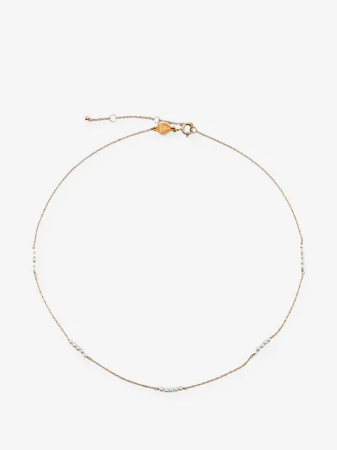 TinyOm collar con detalle de perlas