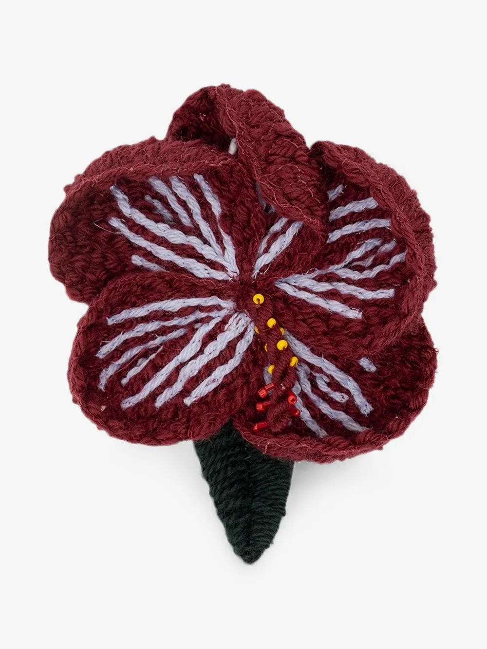 crochet-knit flower brooch