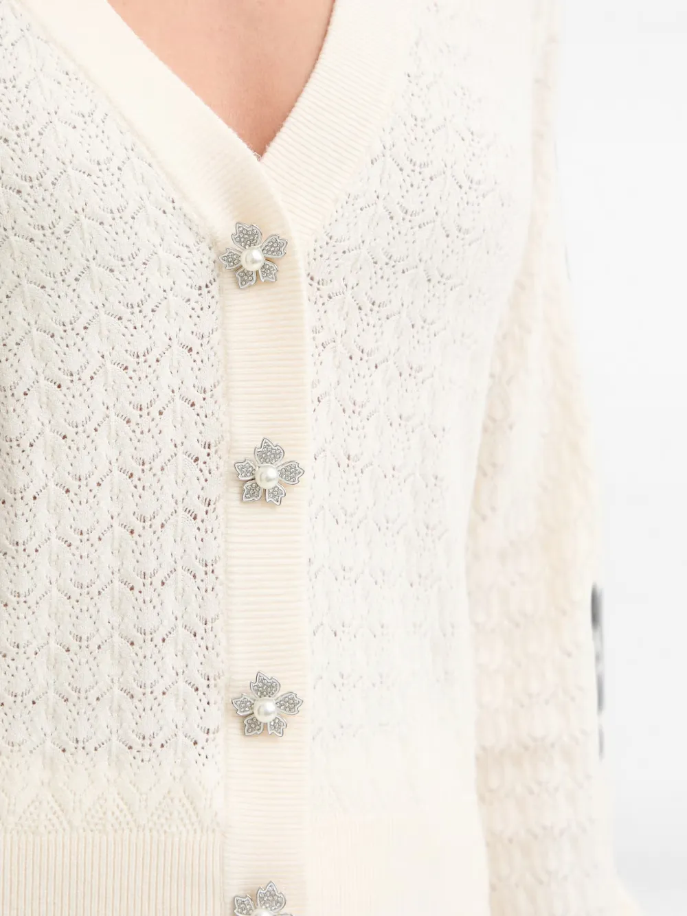 GUESS USA Pointelle gebreid vest met bloem-knopen Beige