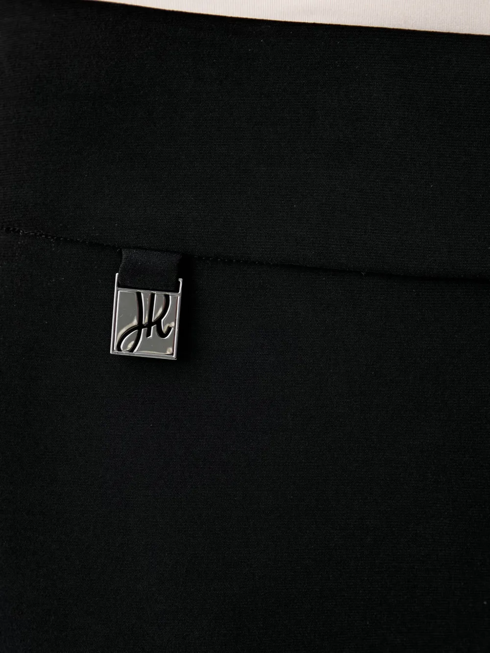 Joseph Ribkoff Geplooide pantalon met logoplakkaat Zwart