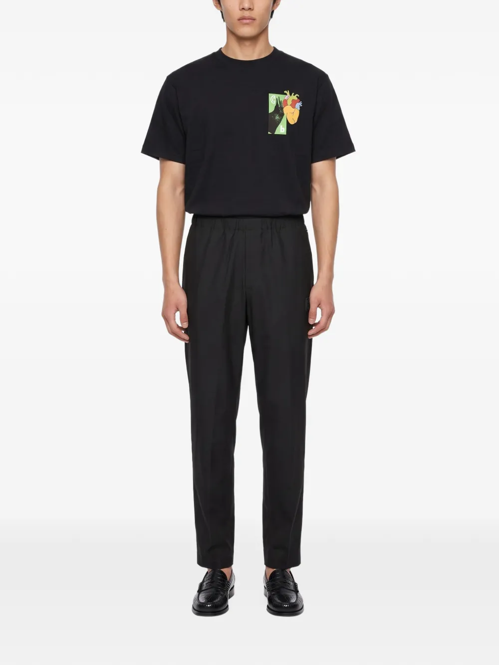 Undercover elasticated-waist logo-patch trousers Zwart