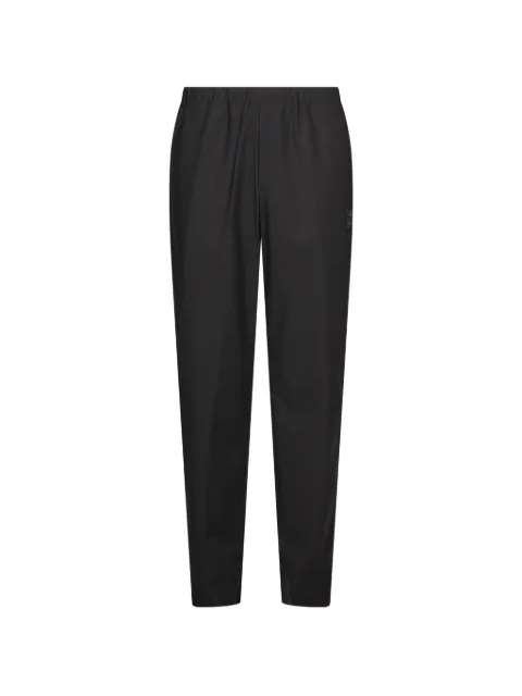 Undercover elasticated-waist logo-patch trousers