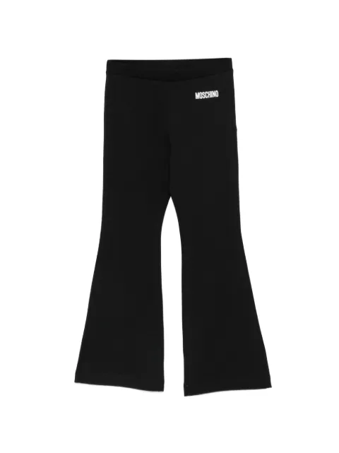 Moschino Kids pantalones acampanados con logo estampado