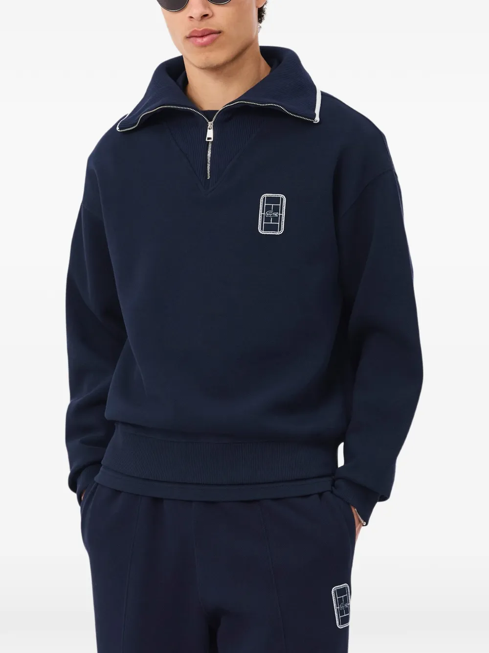 Lacoste Ruimvallende sweater met hoge hals en badge-detail Blauw