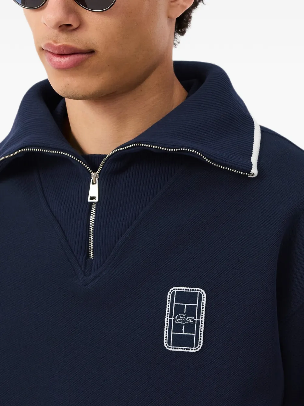 Lacoste Ruimvallende sweater met hoge hals en badge-detail Blauw