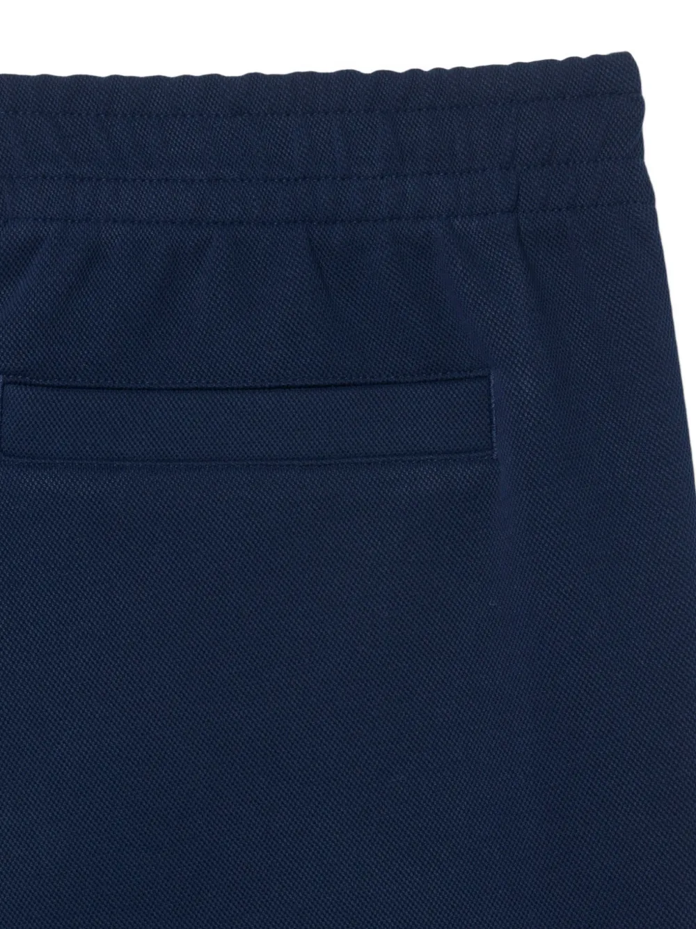 Lacoste Tennis Heritage trainingsbroek met biesafwerking Blauw