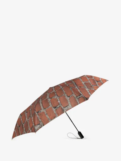 Moschino paraguas plegable con ladrillo estampado