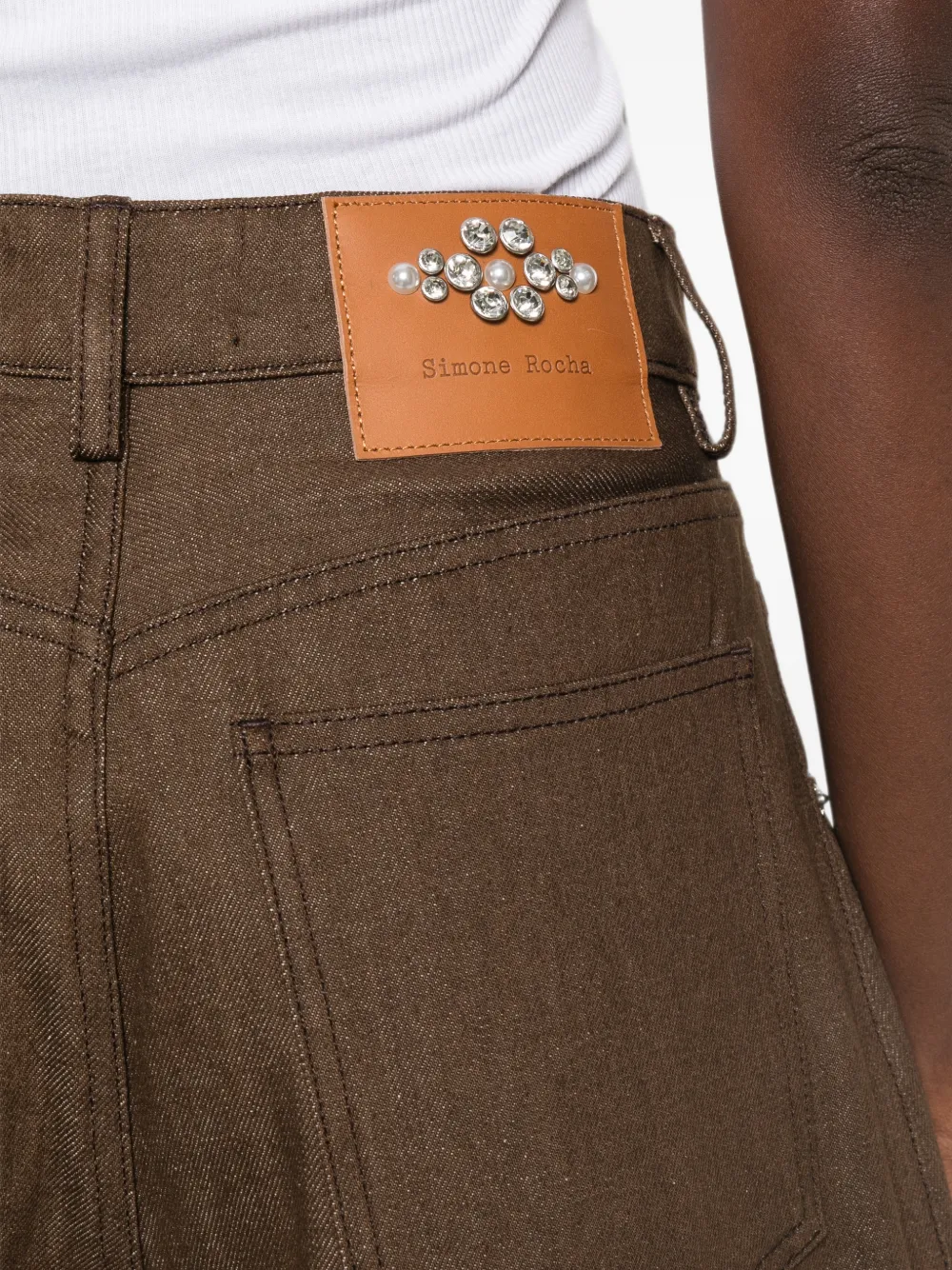 Simone Rocha Verfraaide jeans met logo-patch Bruin