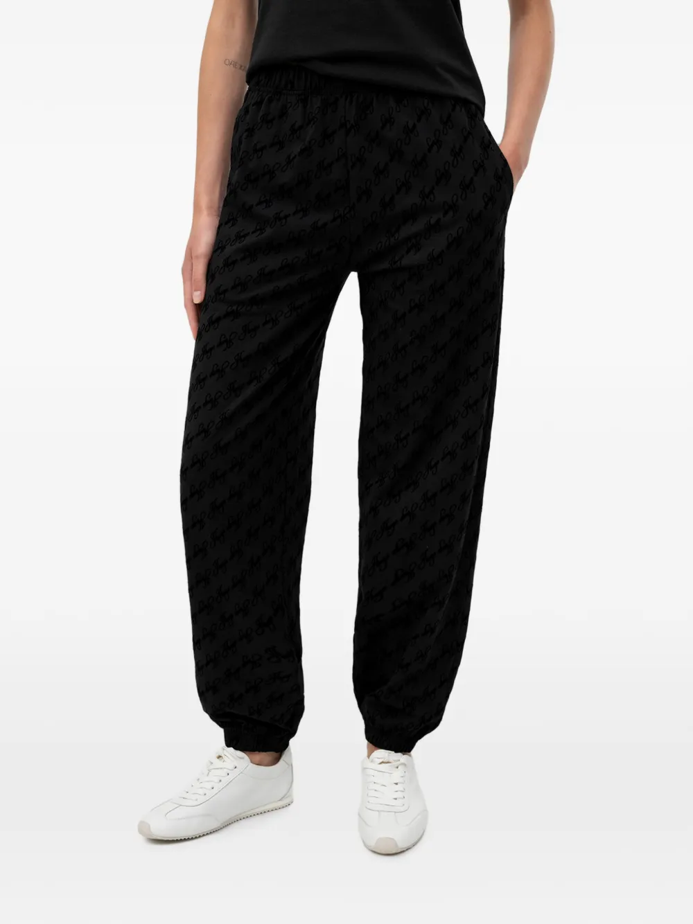 HUGO Flokky ruimvallende trainingsbroek met logo-print Zwart
