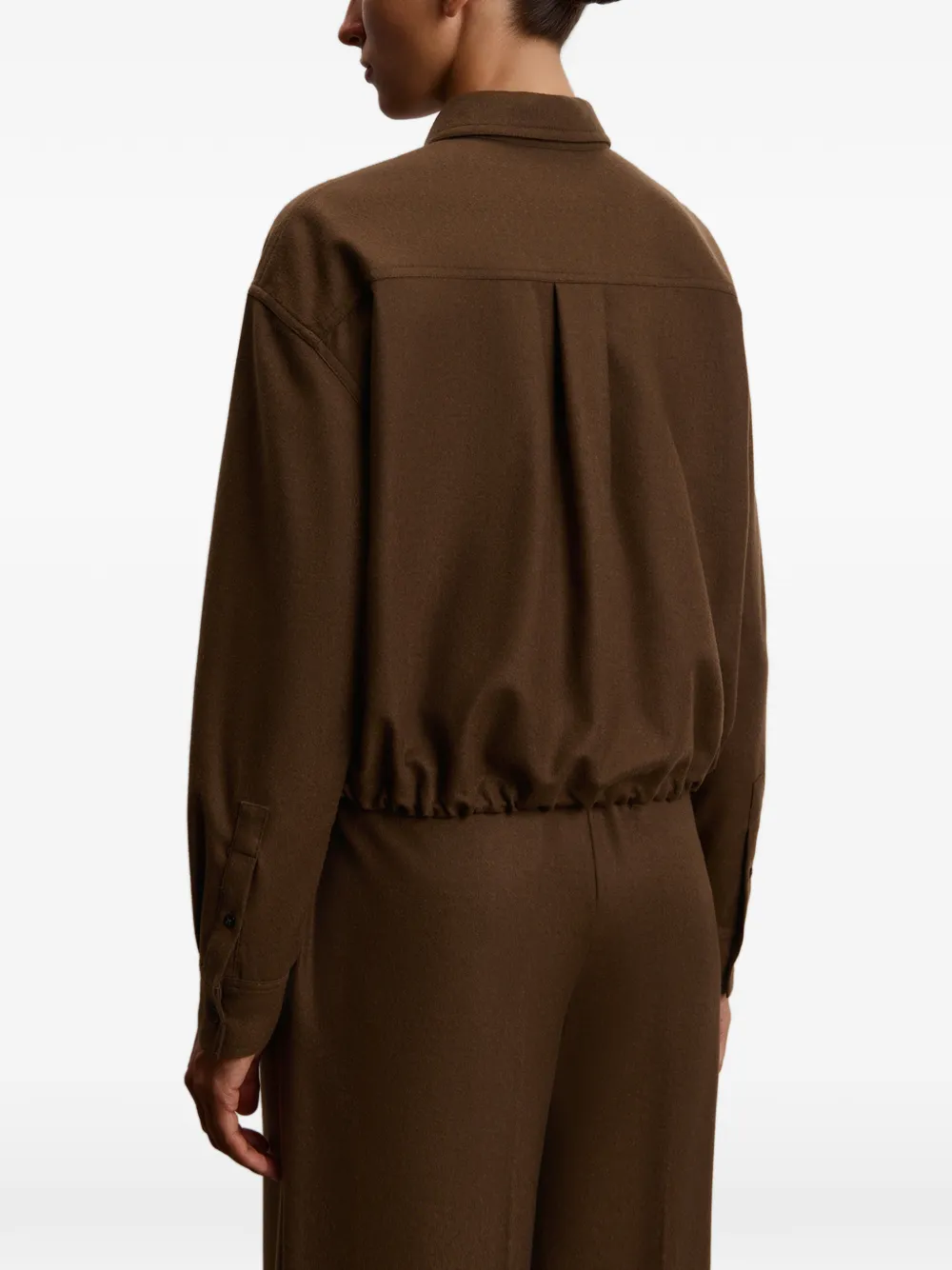 12 STOREEZ Cropped blouse met rits Bruin
