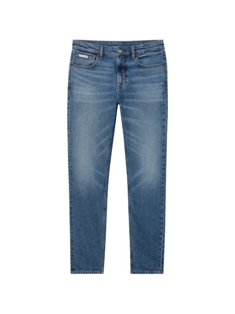 Calvin Klein whiskered faded jeans