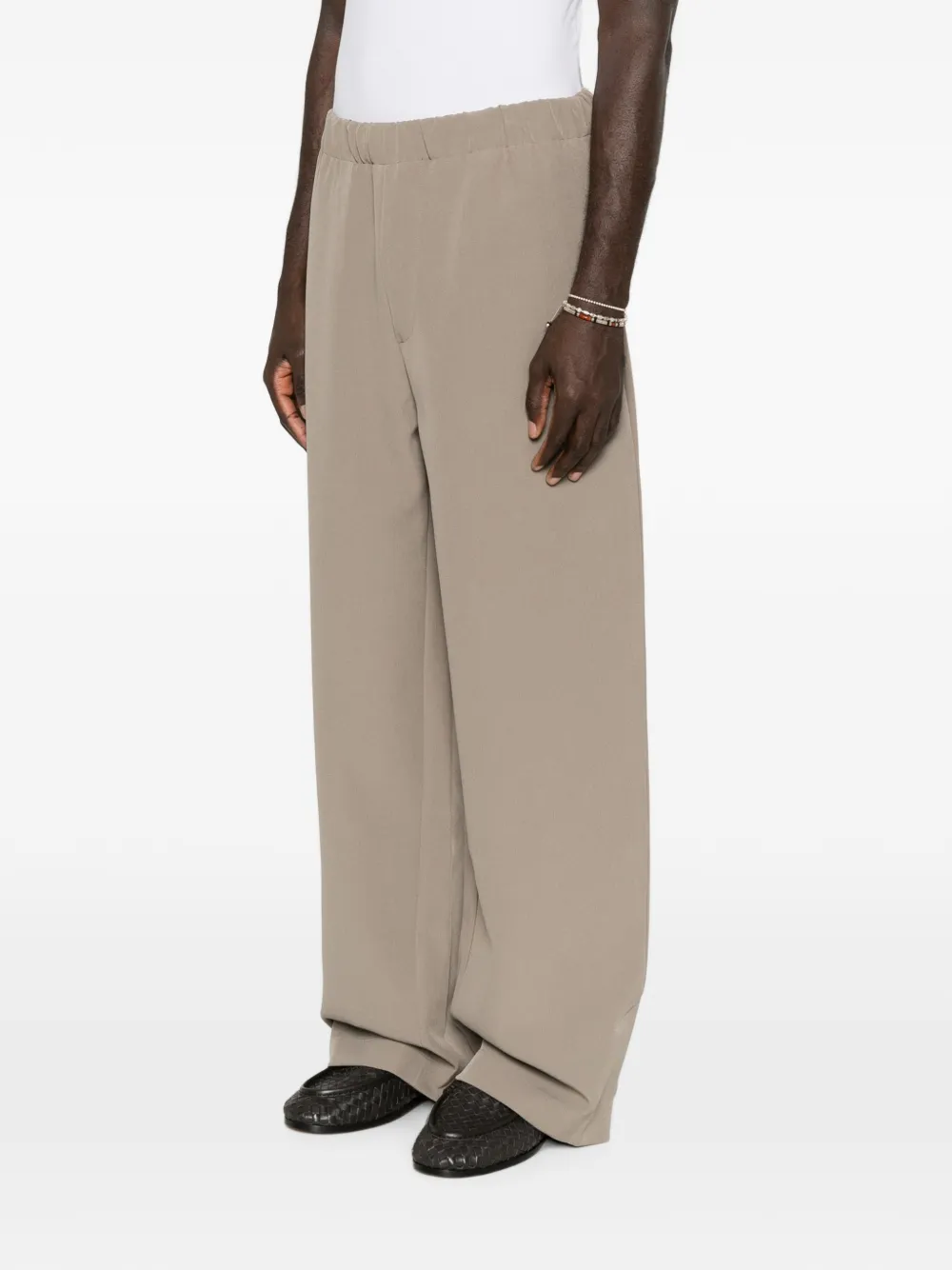 AMIRI Broek met elastische tailleband en logopatch Beige