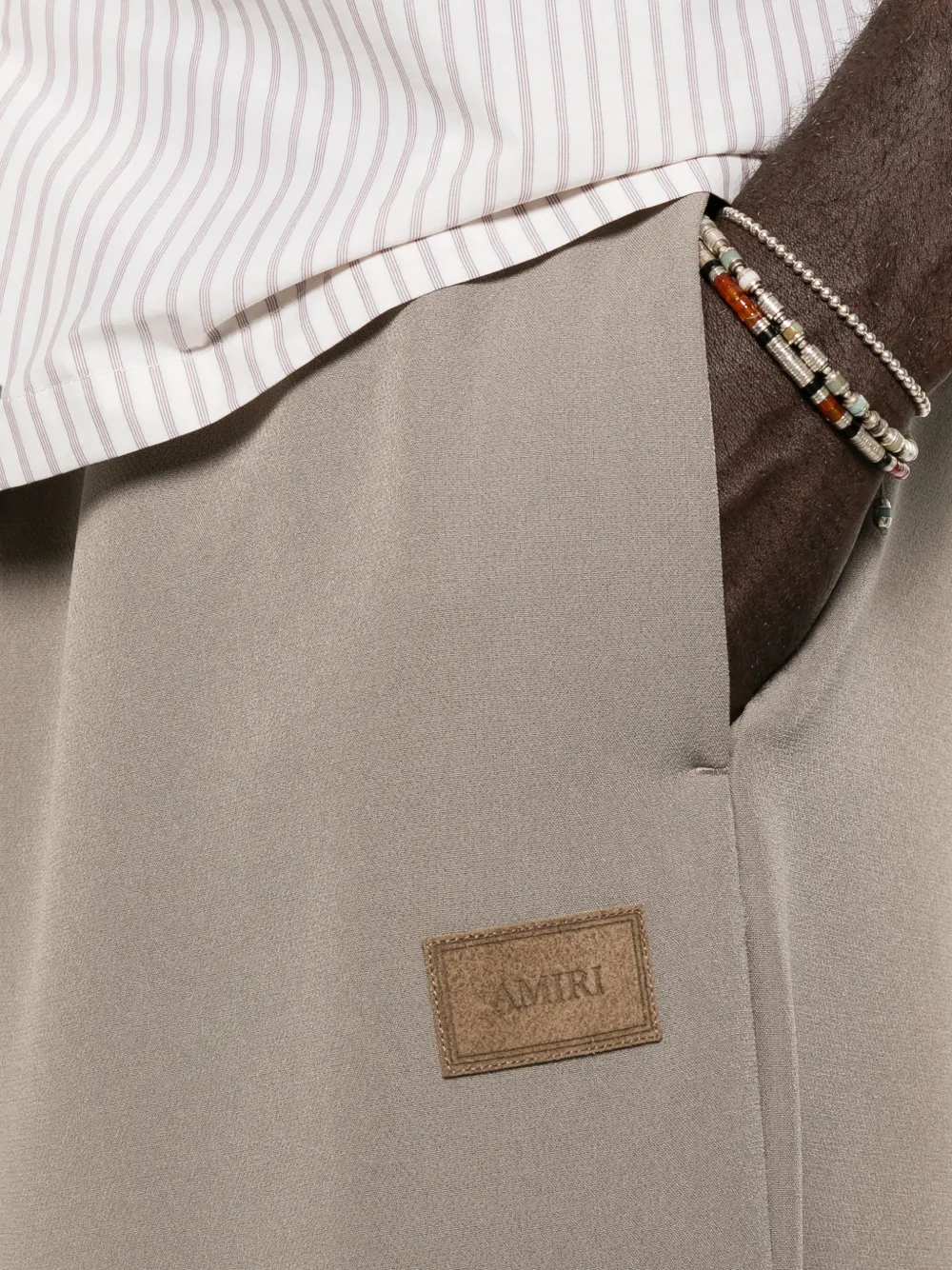 AMIRI Broek met elastische tailleband en logopatch Beige