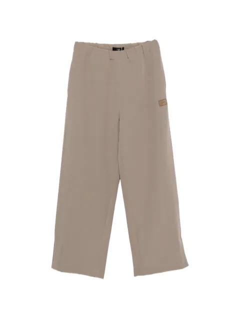 AMIRI elasticated-waistband logo-patch trousers