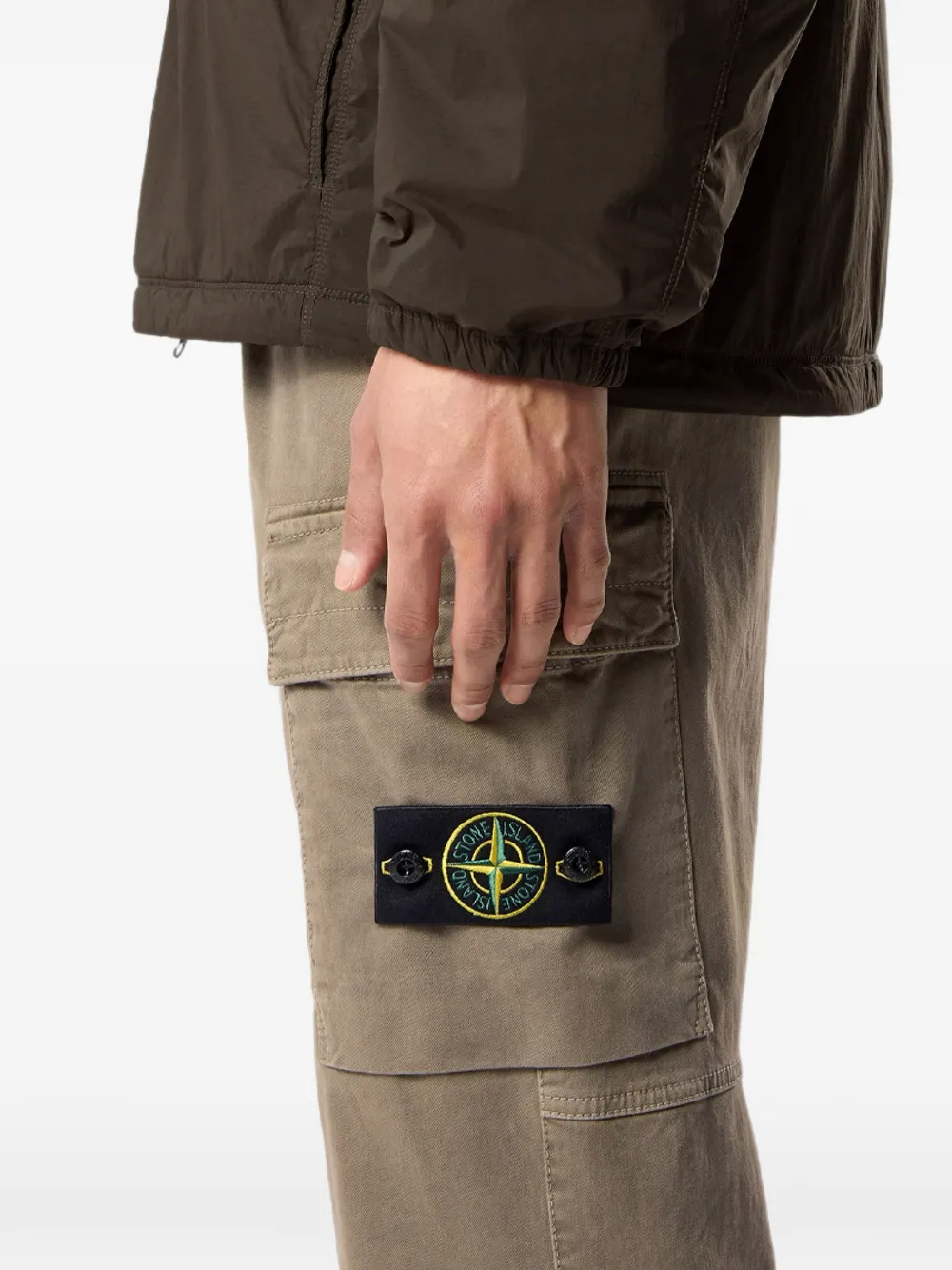 Stone Island 3100033 joggingbroek van biologisch stretchkatoen met gebroken keperbinding en 'OLD'-effect Groen