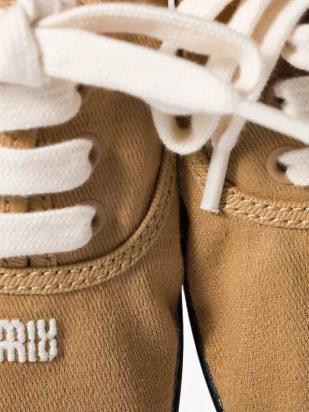 Miu logo-embroidered sneakers Beige
