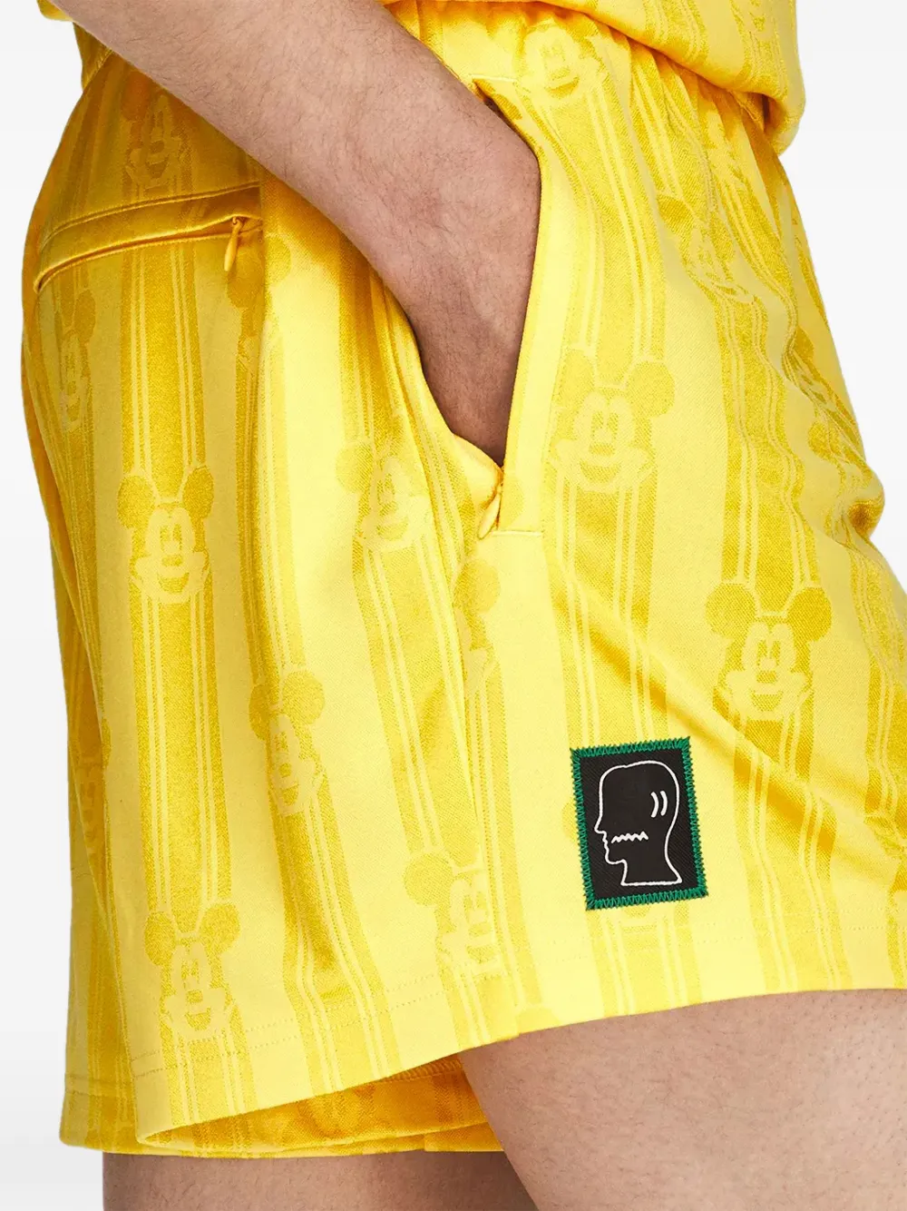 adidas x Disney x Brain Dead trainingsshorts met jacquard-patroon Geel