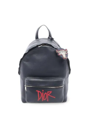 dior mens leather backpack Homme Atelier Logo Navy Blue it presents a practical and spacious interior Christian Dior Backpack HIT THE