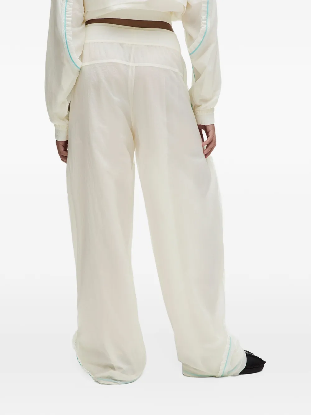 GANNI ruffle-trim track pants Beige